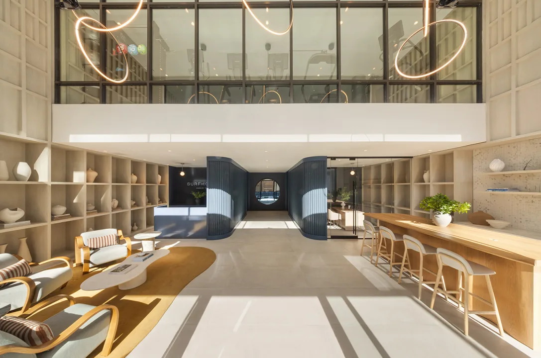 SURFHOUSE apartments in Asbury Park NJ - lobby with modern seating and state-of-the-art fitness center