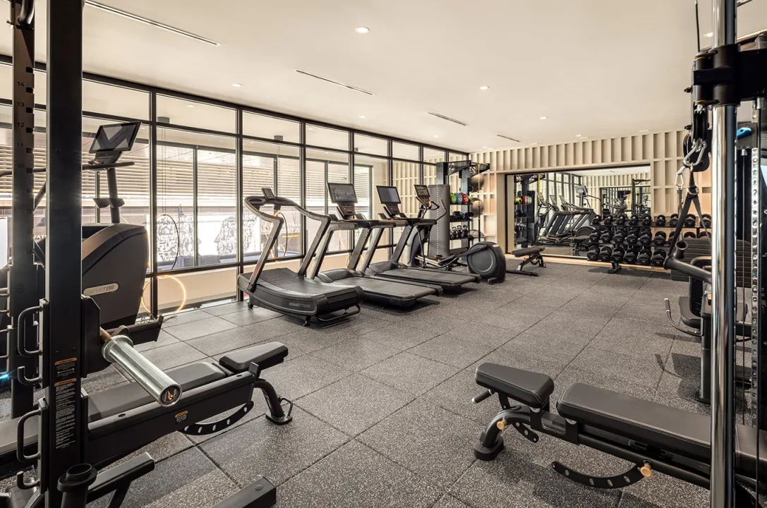 SURFHOUSE fitness room with stair stepper, treadmills, and dumbells at Asbury Park NJ luxury apartments